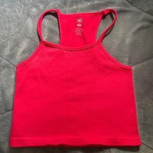Ribbed crop top by aura. It’s a hot pink/ red color. Very soft and stretchy